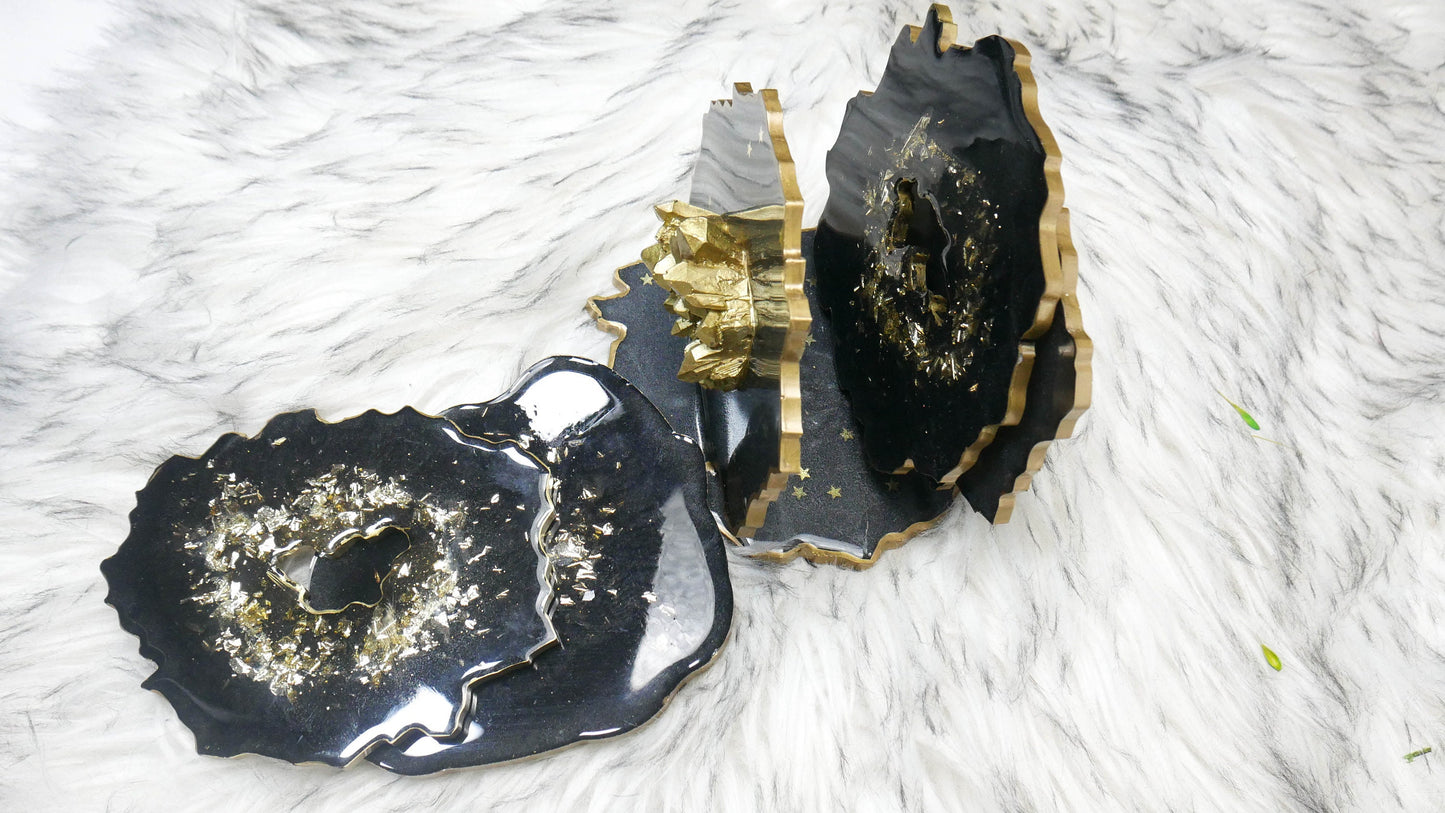 Support de dessous de verre en résine noire avec accents en cristal doré