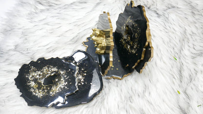 Support de dessous de verre en résine noire avec accents en cristal doré