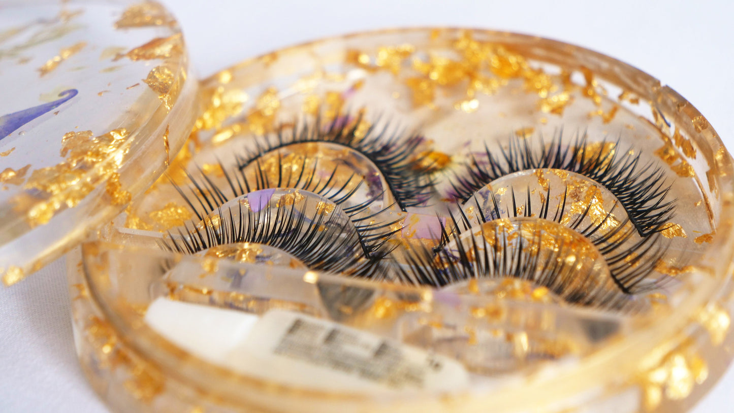 Porte-cils en résine transparente avec feuille d'or