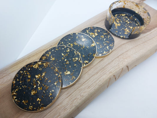 Ensemble de 4 sous-verres en résine à feuilles noires et dorées